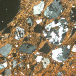 Plate 168.1: Photomicrograph of ROS BB 1 (XPL) (width of field 1.74 mm). Click to see a larger version